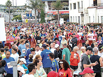 A colorful crowd is ready to run. WtW_ReadytoRun Wharf to Wharf Times Publishing Group Inc tpgonlinedaily.com