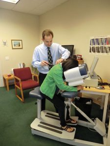 BackPain_Working-on-a-patient Back Pain & Sciatica Times Publishing Group Inc tpgonlinedaily.com