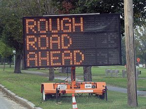 Friend_rough-road-ahead-sign Improve our Roads Times Publishing Group Inc tpgonlinedaily.com